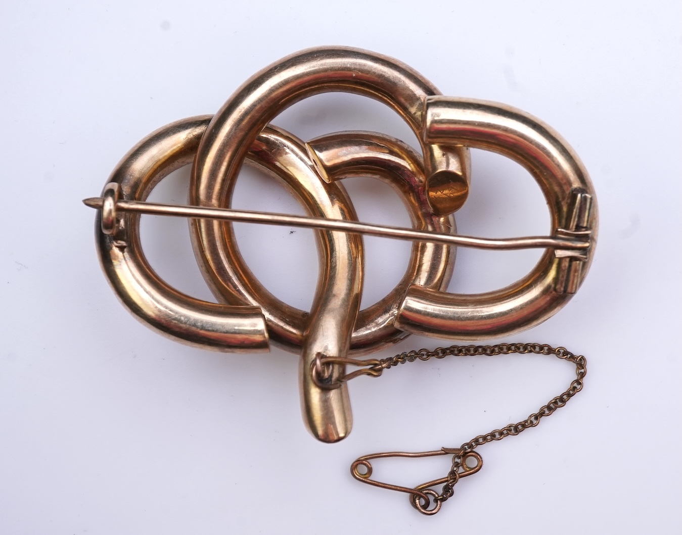 Four brooches and a gold signet ring
